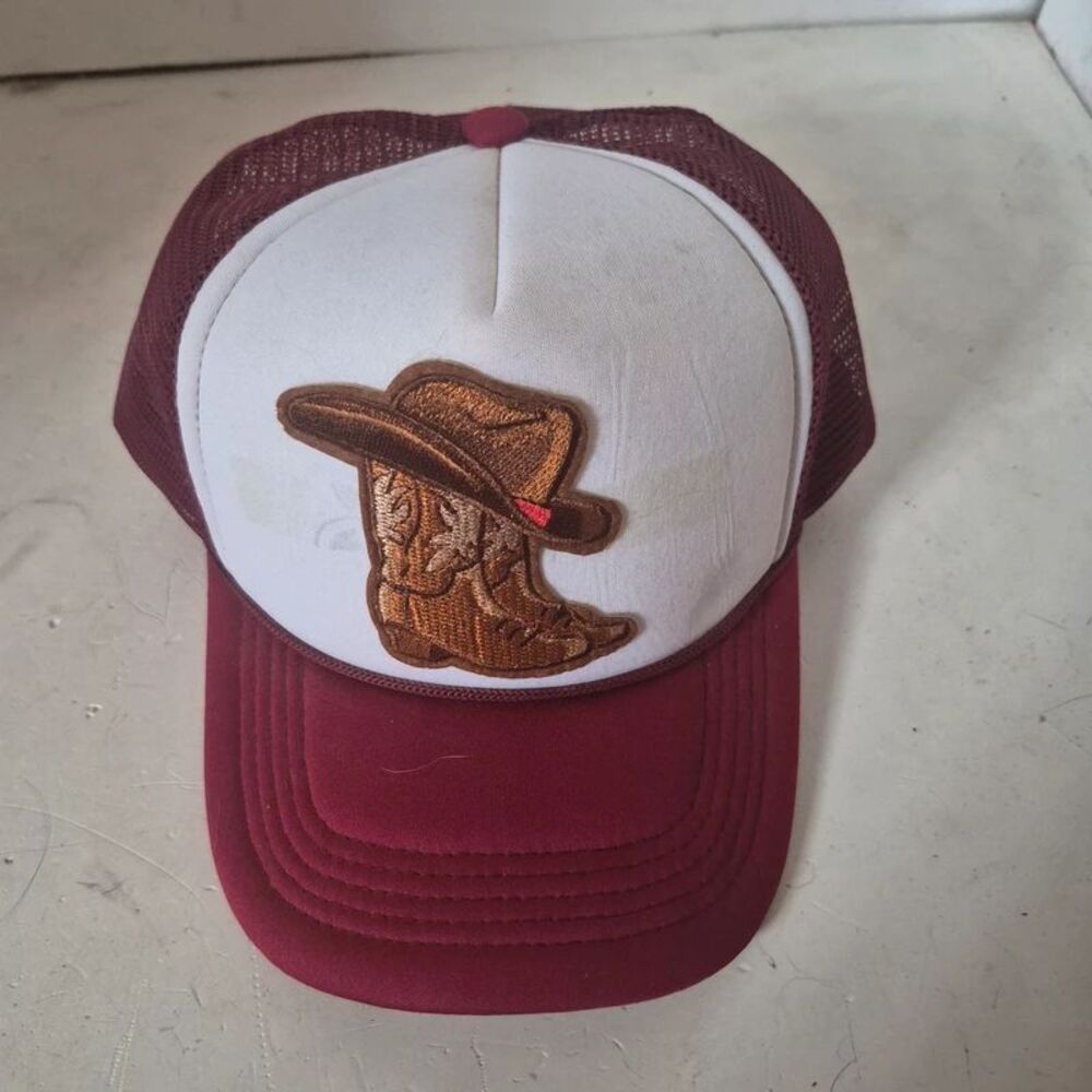 Red polyester mesh trucker hat with cowboy hat/boots iron on